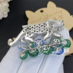 Cartier. Panthere De Cartier. Platinum, Diamond, Emerald, Sapphire & Onyx Panther Brooch (3)